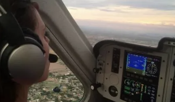 Student pilot flying over the Phoenix Valley in a Fly Eagle Sport Remos GX